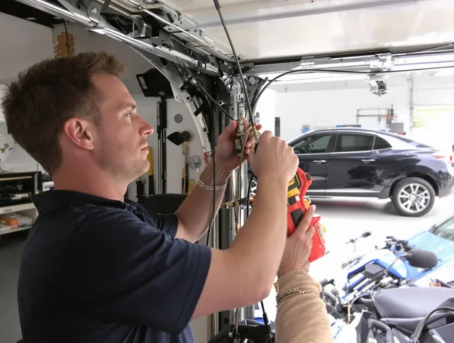 Castle Rock Garage Door Repair safety certified technician performing cable replacement in Castle Rock