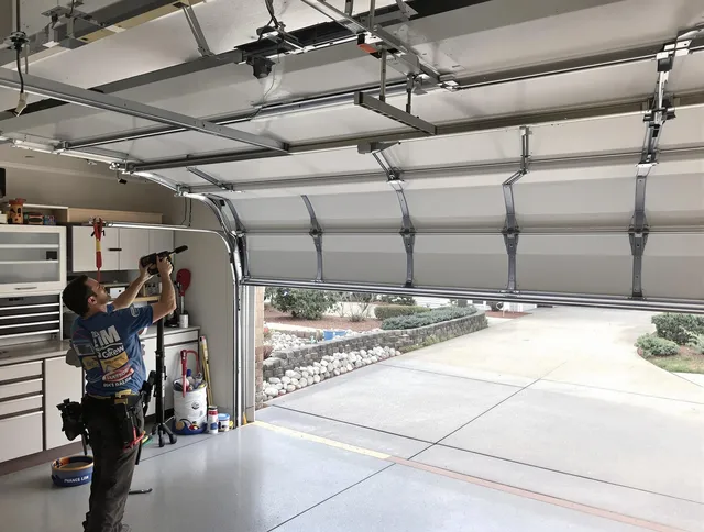 Garage door track repair service by Castle Rock Garage Door Repair in Castle Rock